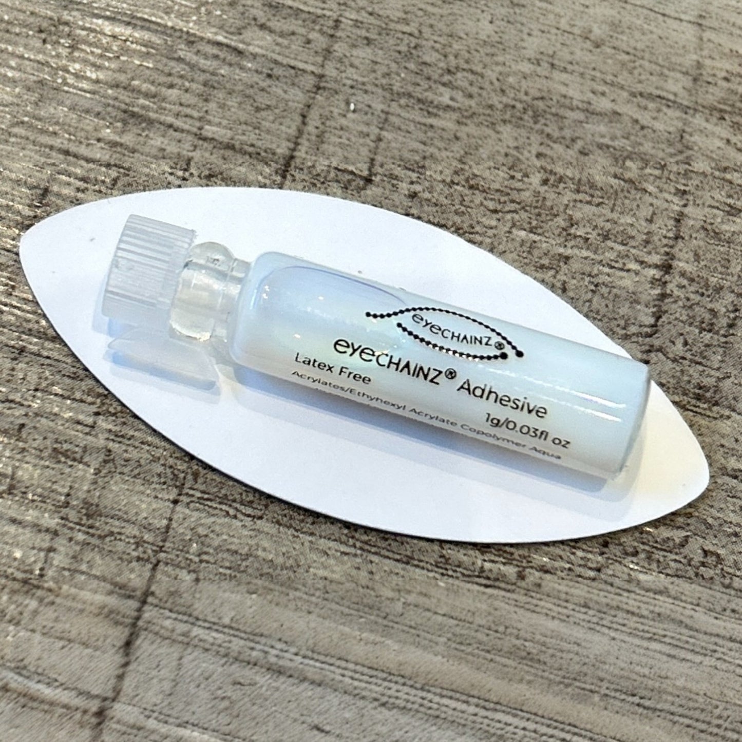 Eyechainz branded adhesive.