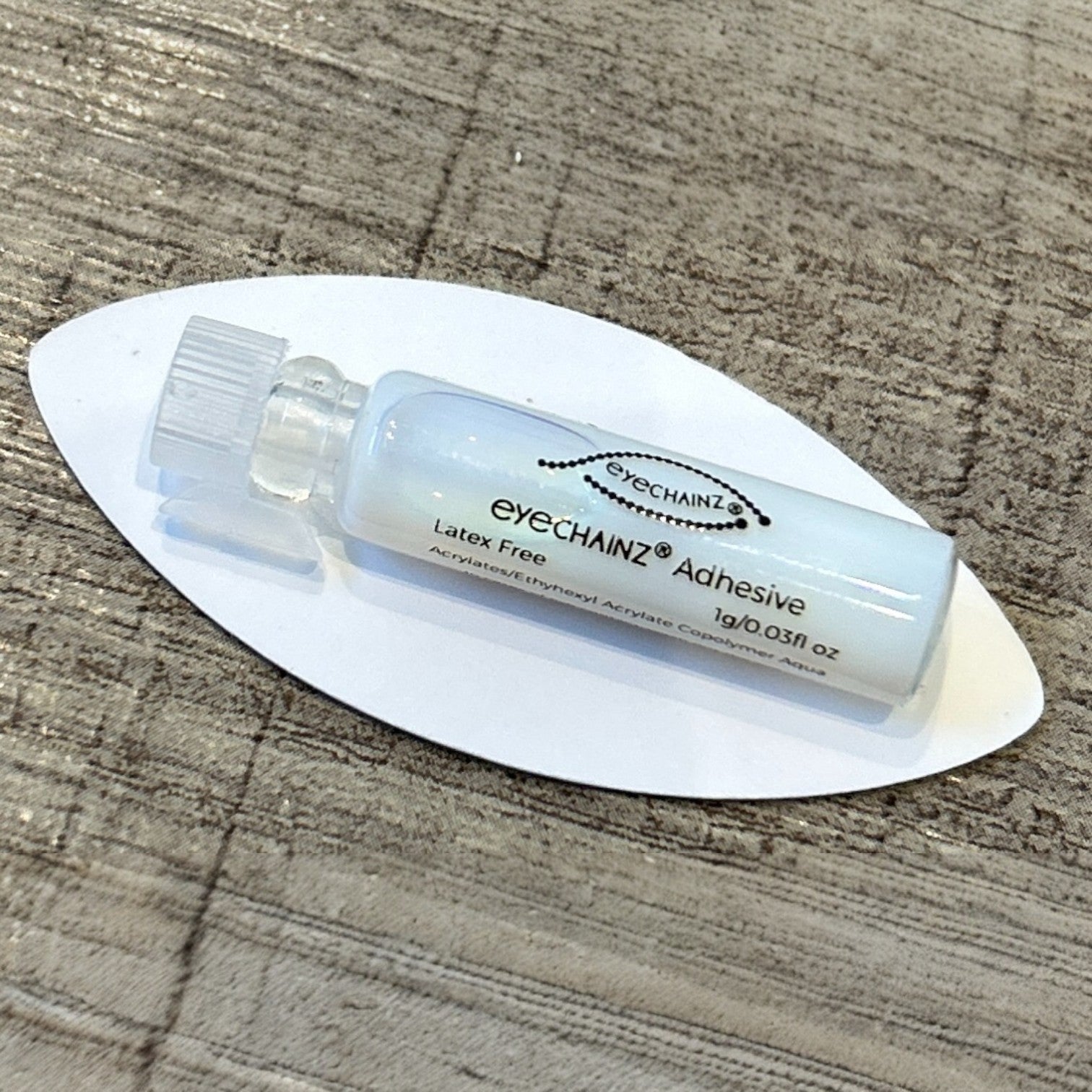 Eyechainz branded adhesive.